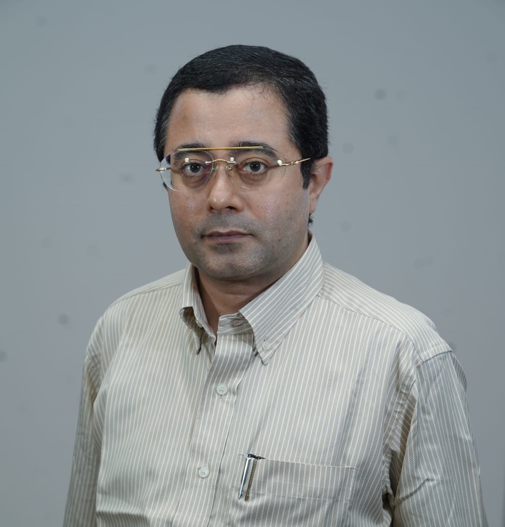 Dr. Manuel John 
